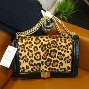 Faux leather and leopard pattern handbag
